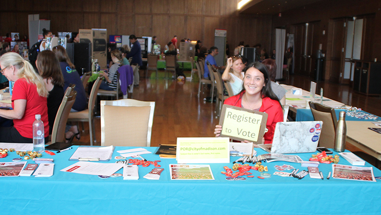 Emily Hutchins registers voters at this year's Public Service Fair.