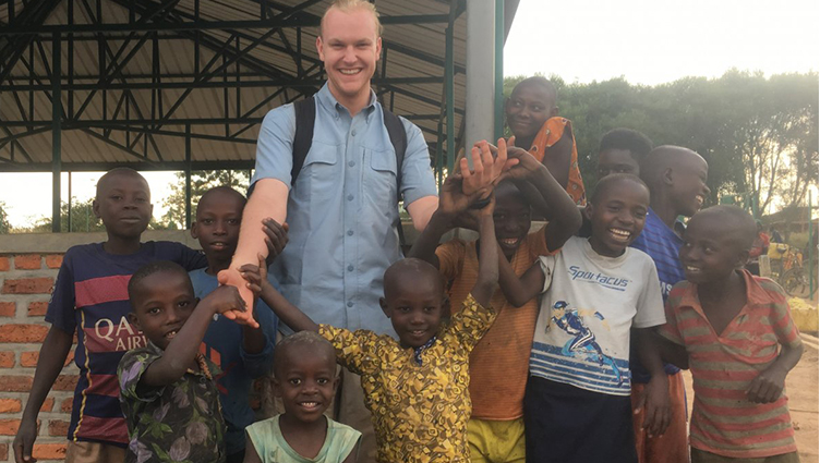 Olson_in_rwanda_with_kids