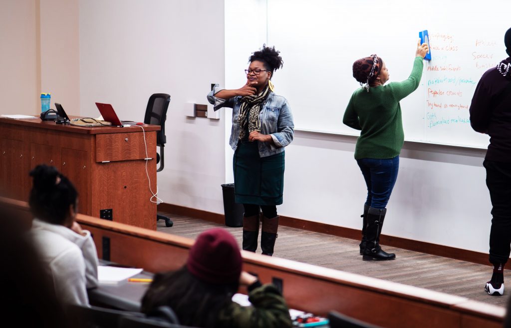 Bianca Baldridge, assistant professor in education policy studies at the University of Wisconsin-Madison, lectures to students during her Education Policy 210: Youth, Education and Society class in the Education Building.