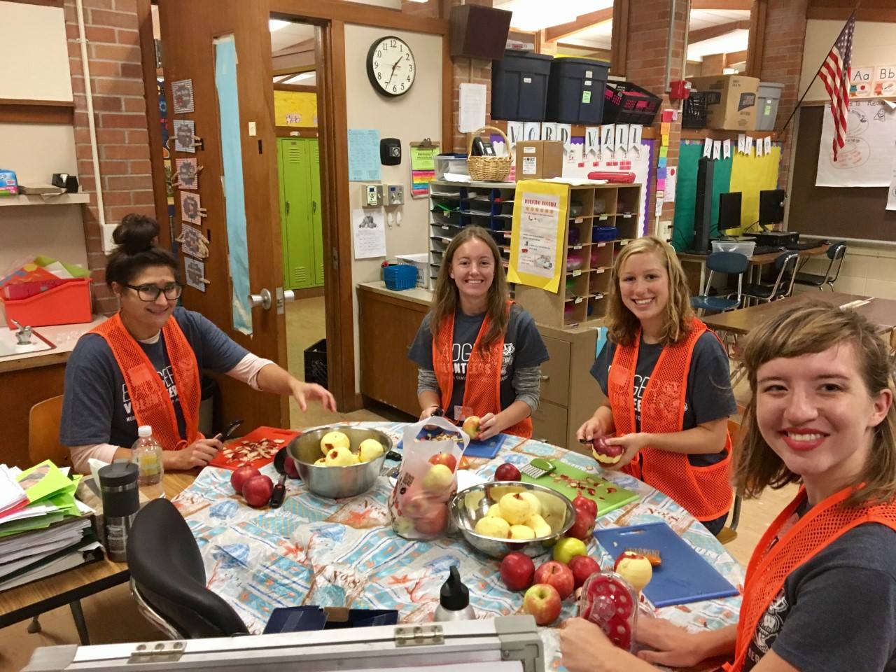 Gillian McBride (far right) at Lakeview Elementary as a Badger Volunteer Team Leader.