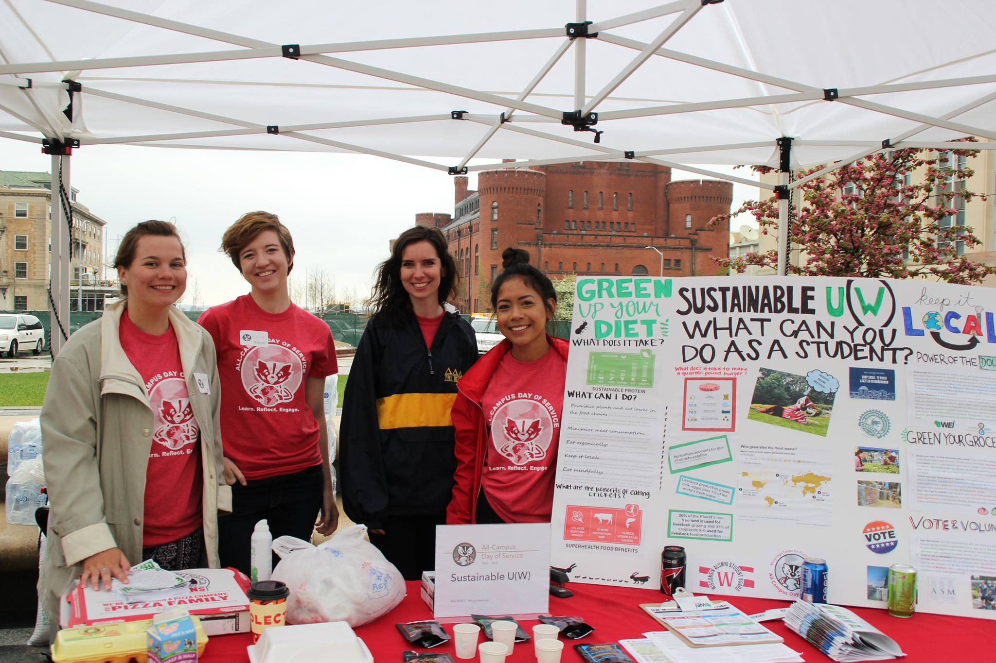 McBride at the 2017 All-Campus Day of Service, when she and fellow intern Junalee Ly (far right) organized a sustainability-themed booth.