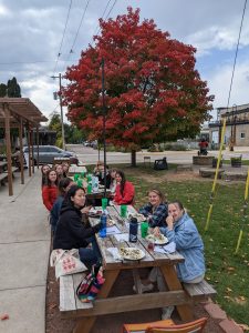 Reynolds's students eating lunch at Brix Cider