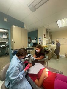 PEACS Students Volunteers cleaning