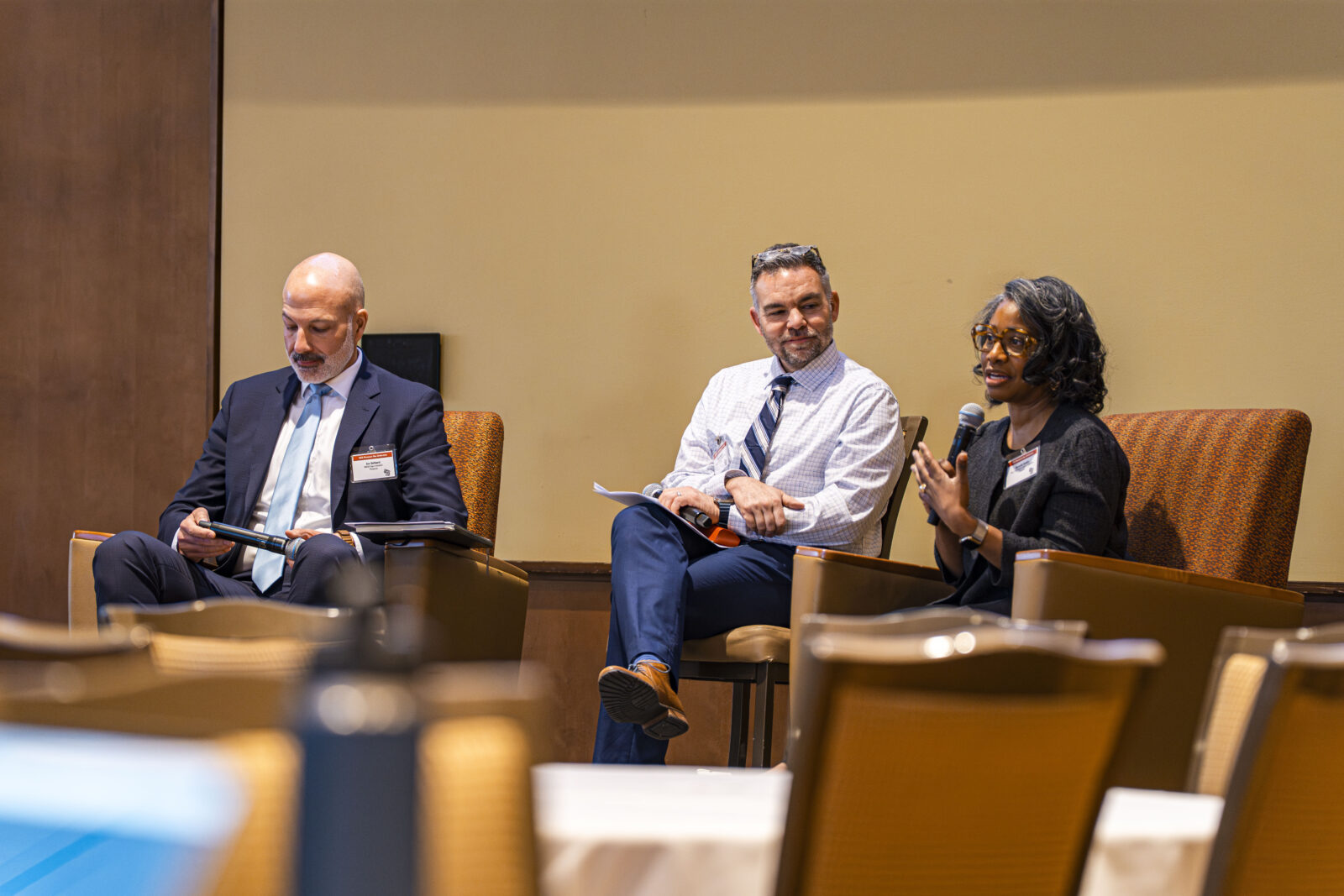 The 2024 Wisconsin Idea Conference kicked off with a fireside chat with Dr. Travis Wright (middle) as the moderator. The chat included Madison Metropolitan School District Superintendent Dr. Joe Gothard (left) and School of Education Dean Marcelle Haddix (right).